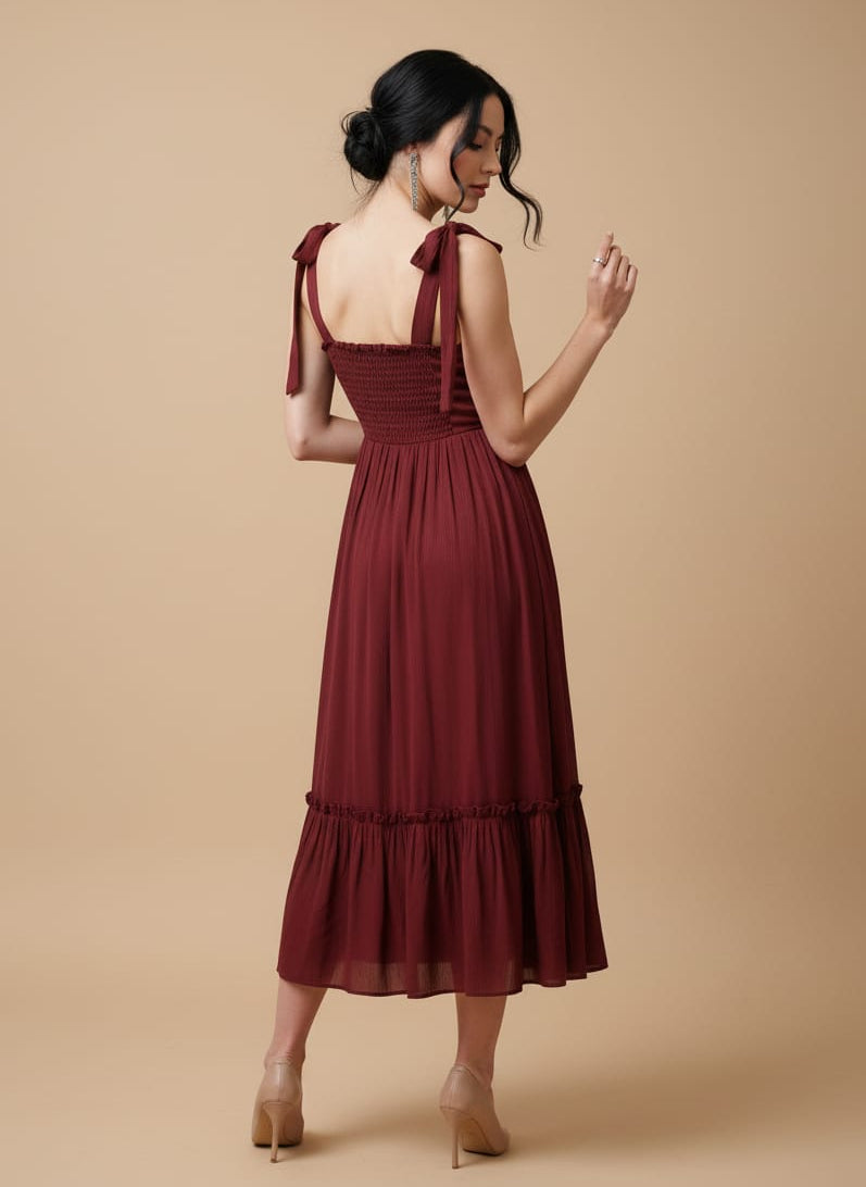 Vestido midi con moños