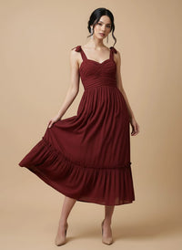 Vestido midi con moños