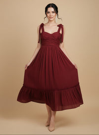 Vestido midi con moños